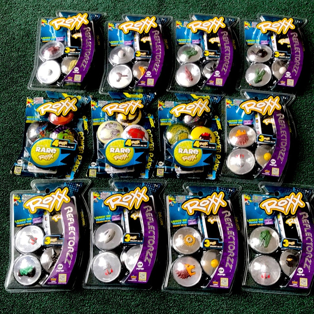 12 New unopened Roxx Reflectorzz and Power Paxx collectible packages